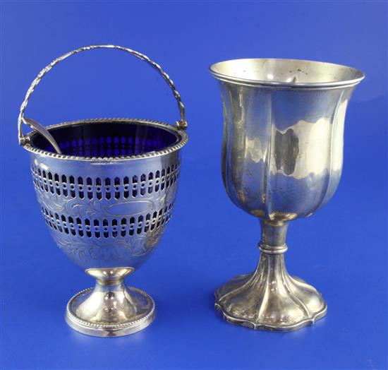 A William IV silver goblet & a Victorian silver sugar basket.